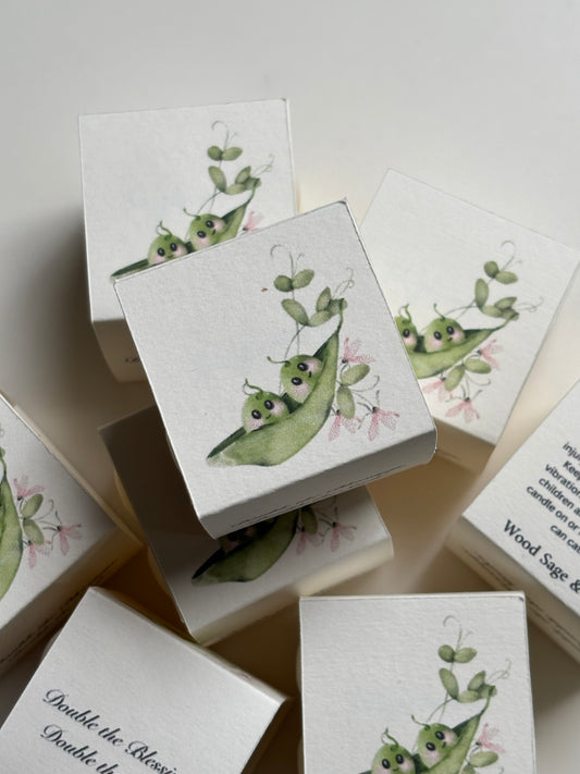 Twin baby shower mini bubble candle favours in personalised favour boxes featuring a cute peas-in-a-pod design, handmade by The Light Candle Co.