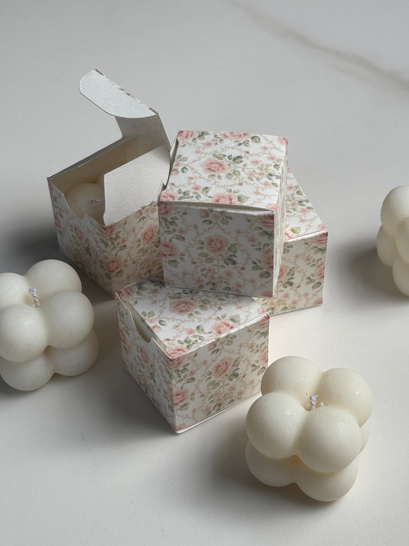 Custom floral favour box with an ivory mini bubble candle, luxury personalised wedding and Nikkah guest favour by The Light Candle Co.